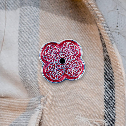 Celtic Knot Poppy Brooch shown pinned on a scarf - Poppyscotland